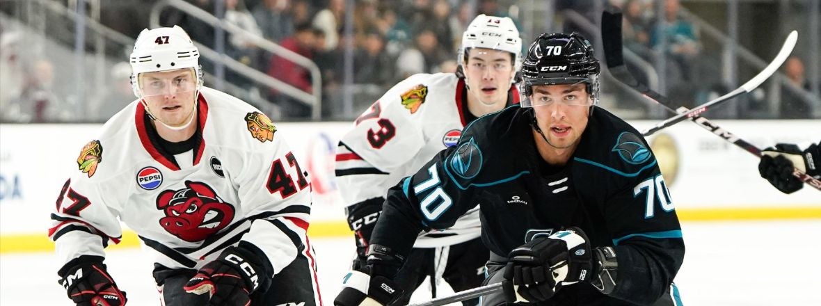 MUKHAMADULLIN SCORES LATE BUT THE BARRACUDA FALL BIG TO ICEHOGS, 7-2, IN SEASON OPENER